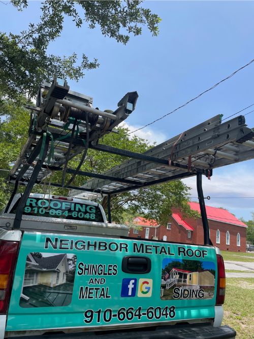 Neighbor Metal Roof's Truck